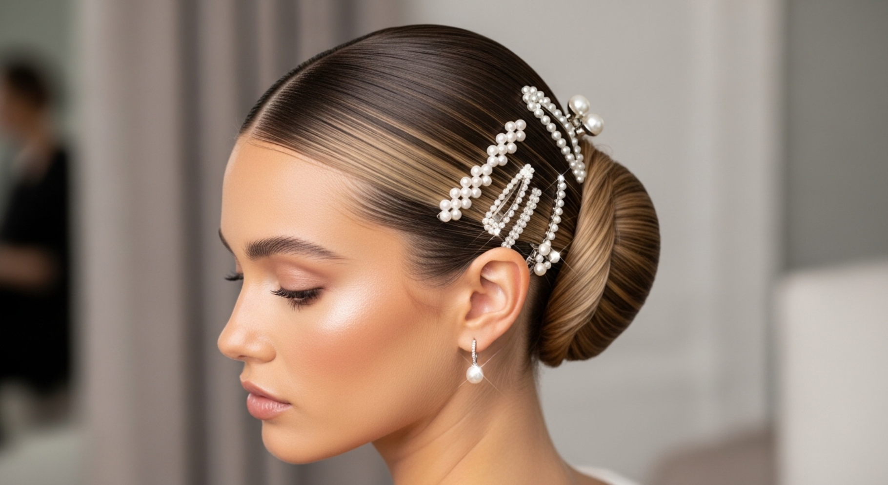 Sleek Low Bun with Center Part